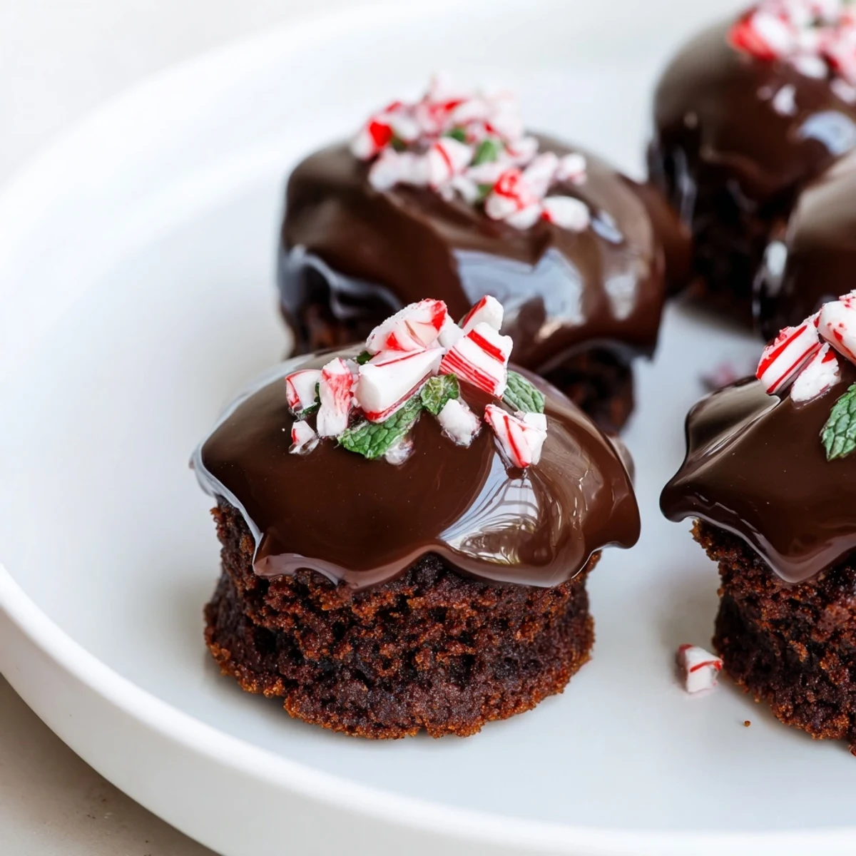 A single Mint Brownie Bite shows a moist crumb and smooth dark chocolate topping.