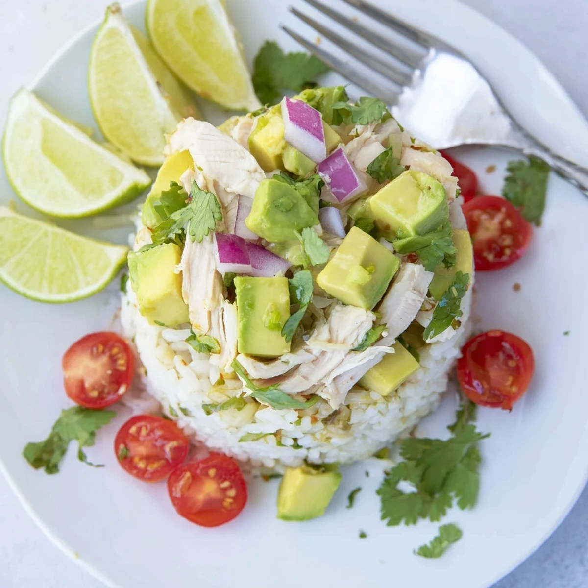 Layered honey lime chicken avocado rice stack featuring tender marinated meat with zesty lime and sweet honey glaze