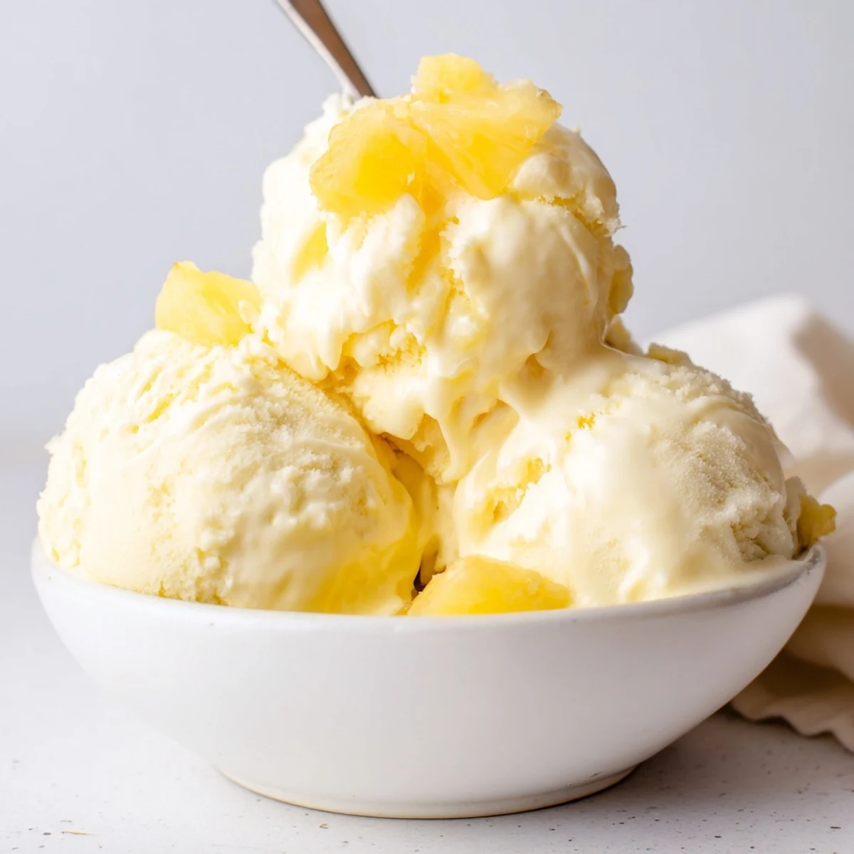 Creamy Pineapple Ice Cream Recipe with silky scoops and bright tropical aroma